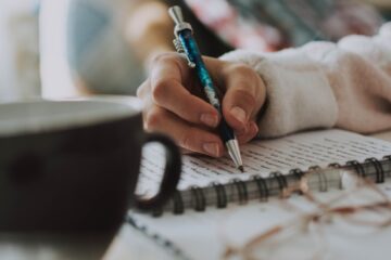 selective focus photography of pen